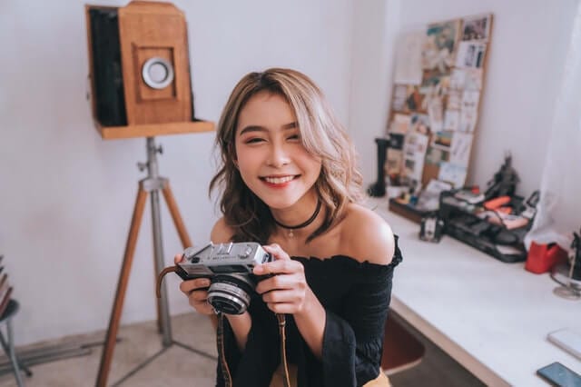 Asian photographer girl smiling