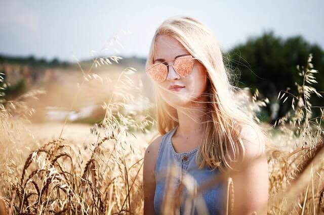 Natural blonde girl wearing sunglasses